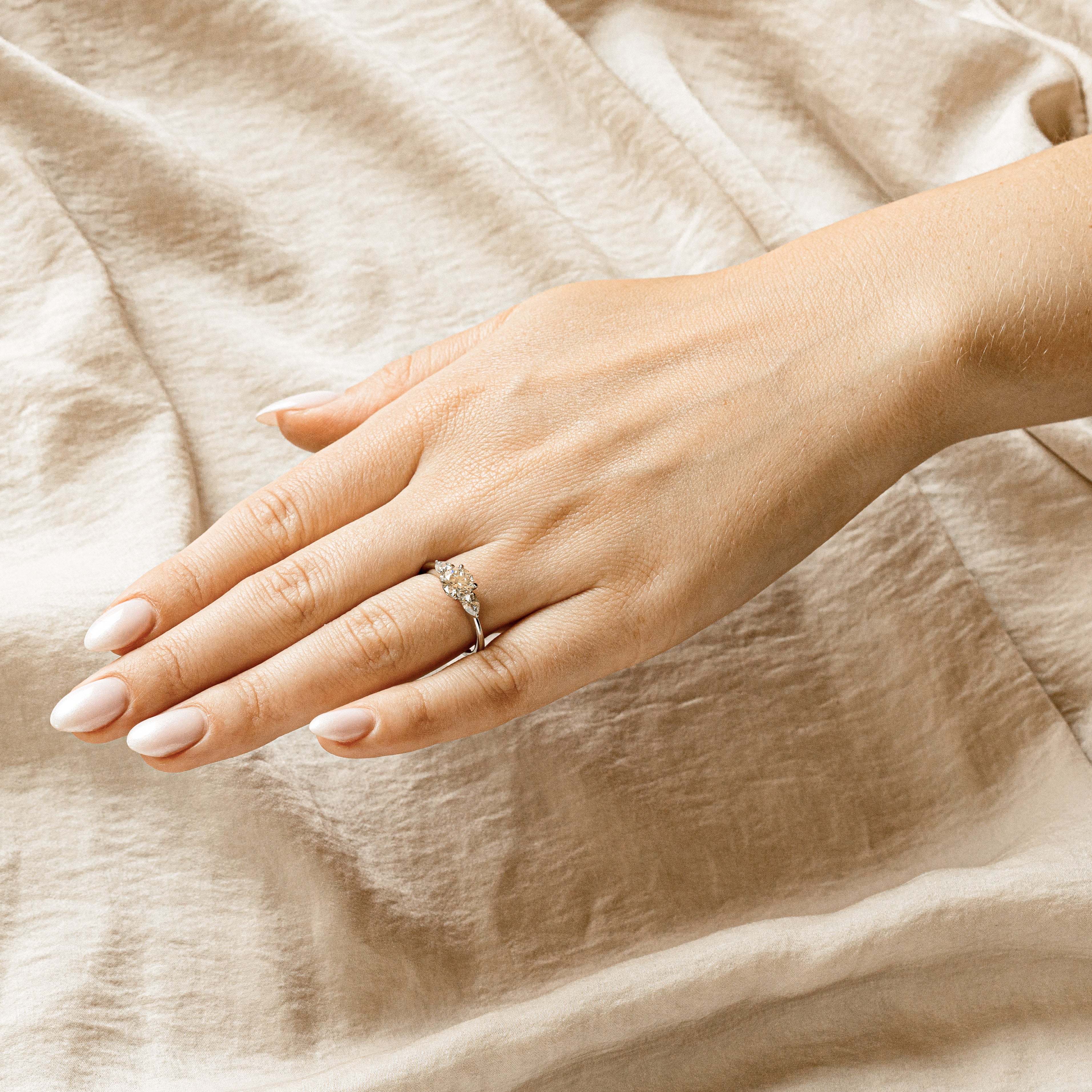 1.04 Carat Round Brilliant Diamond Three Stone Pear Accent Engagement Ring in Platinum -  Replica Handbags 