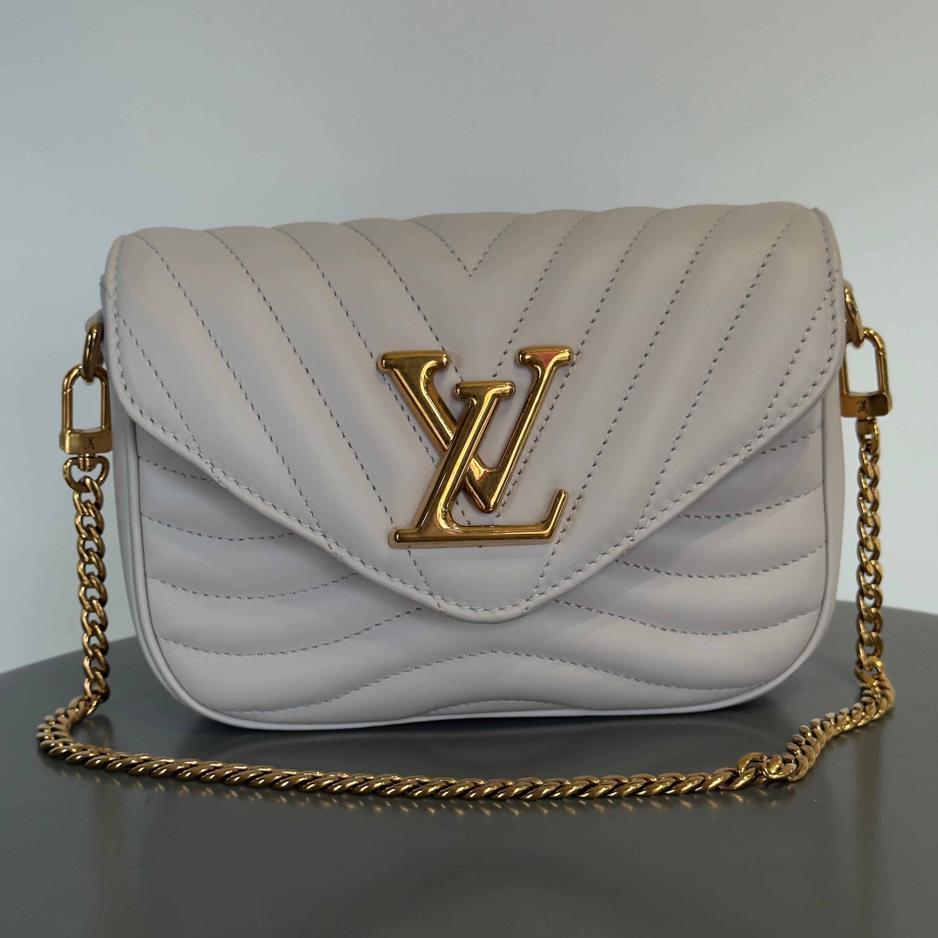 Louis Vuitton Wave Multi Pochette -  Replica Handbags 
