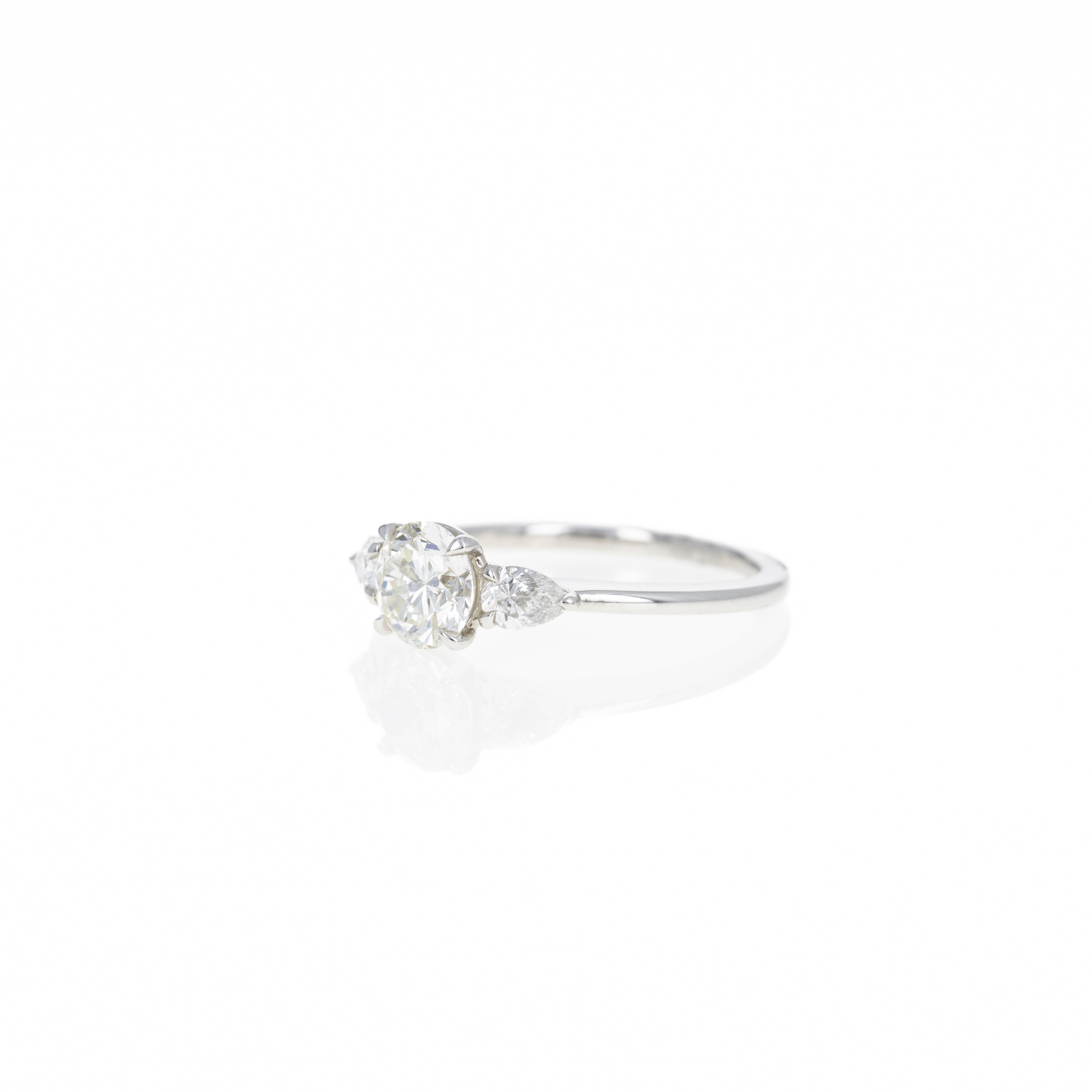 1.04 Carat Round Brilliant Diamond Three Stone Pear Accent Engagement Ring in Platinum - Replica Handbags