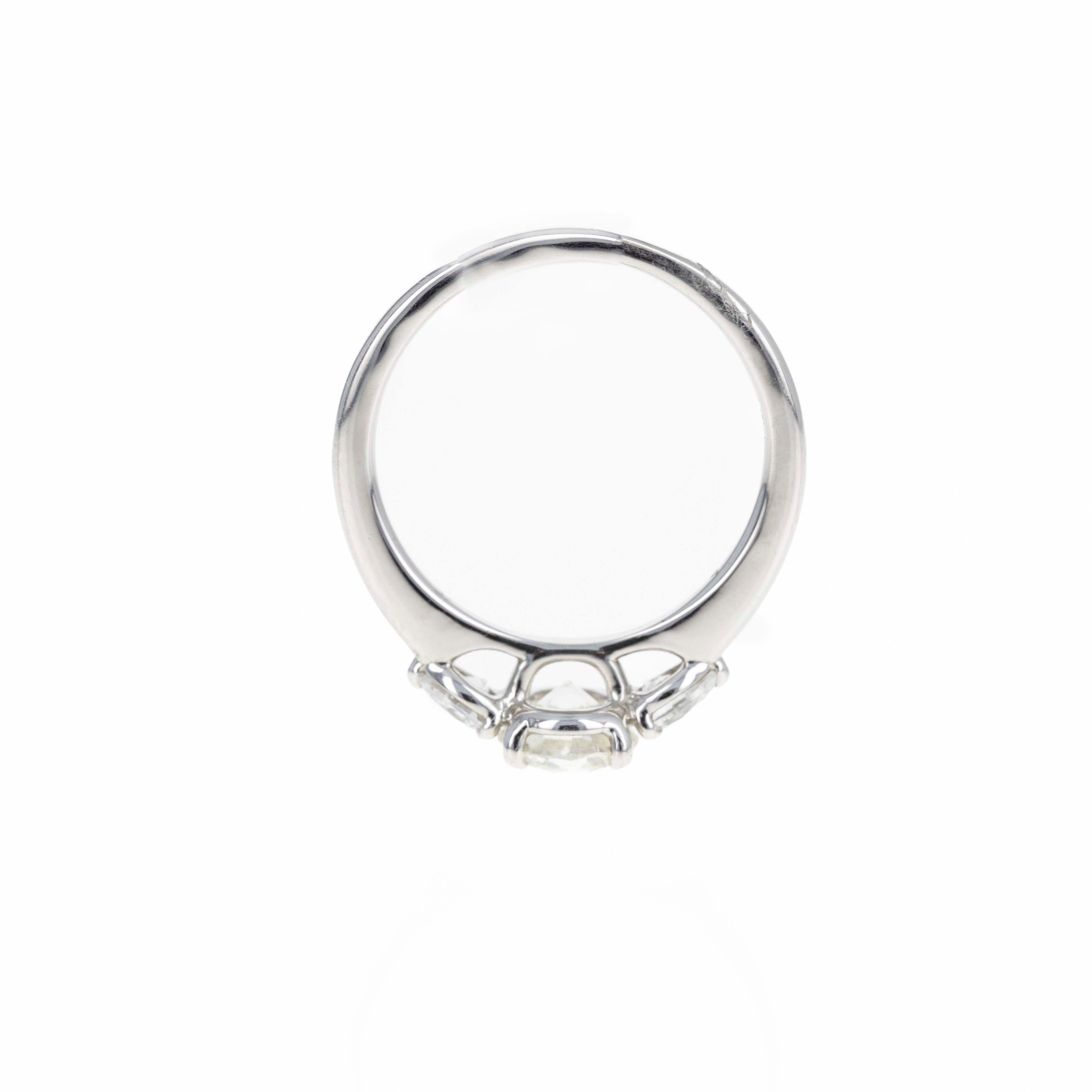 1.04 Carat Round Brilliant Diamond Three Stone Pear Accent Engagement Ring in Platinum -  Replica Handbags 