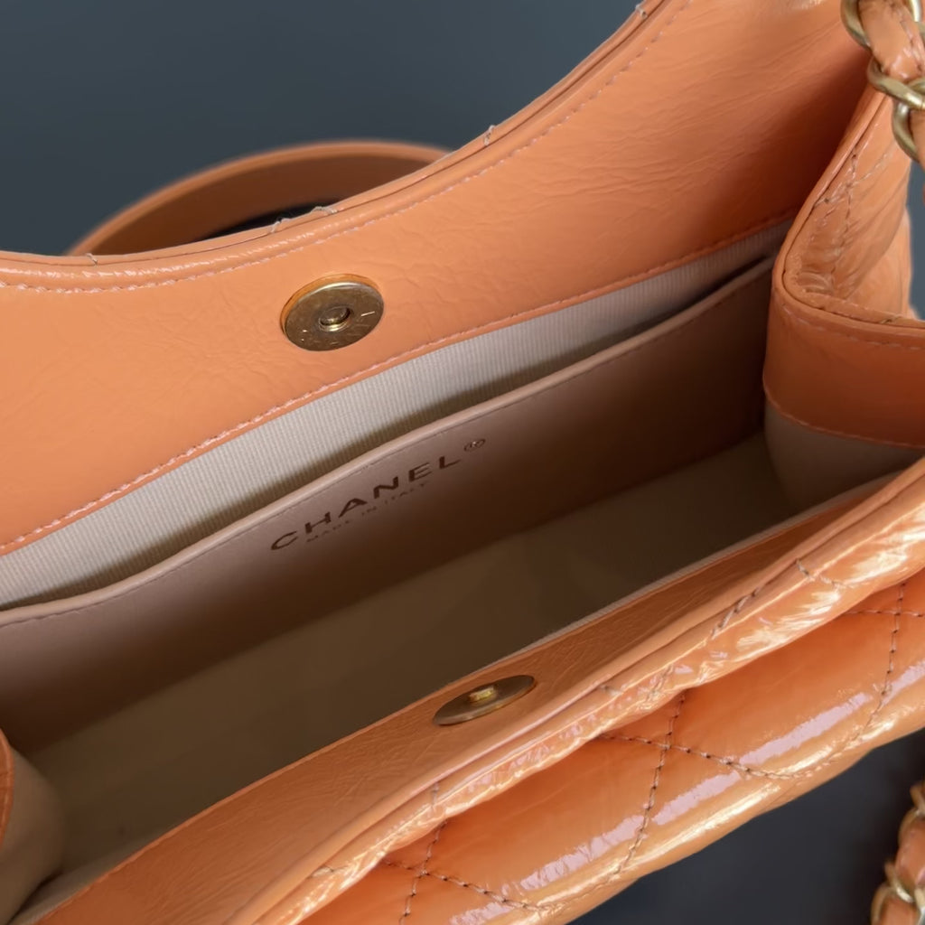 Chanel Orange Shiny Crumpled Quilted Leather Small Wavy CC Hobo 2023 -  Replica Handbags 